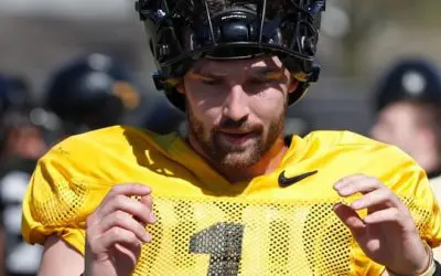 Friday CFB: Wisconsin at Purdue Pick ATS