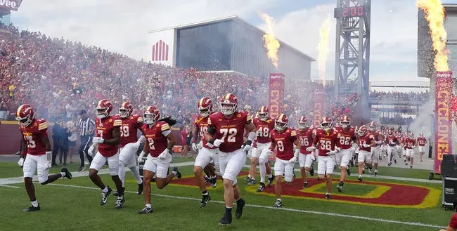 Iowa State football team enter the field before the game against South Dakota at Jack Trice Stadium on August 30, 2025, in Ames, Iowa