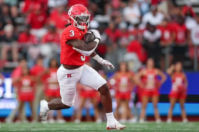 Aug 28, 2025; Piscataway, New Jersey, USA; Rutgers Scarlet Knights running back Antwan Raymond (3) rushes for a touchdown during the first half against the Ohio Bobcats at SHI Stadium. Mandatory Credit: Vincent Carchietta-Imagn Images