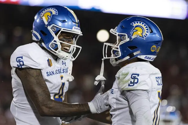 Sep 27, 2025; Stanford, California, USA; San Jose State Spartans wide receiver Kyri Shoels (4) celebrates with wide receiver Danny Scudero (10) during the fourth quarter against the Stanford Cardinal at Stanford Stadium. Mandatory Credit: Stan Szeto-Imagn Images