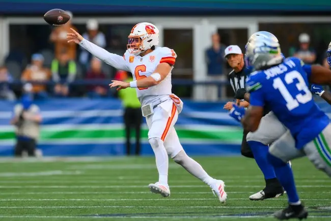 Oct 5, 2025; Seattle, Washington, USA; Tampa Bay Buccaneers quarterback Baker Mayfield (6) passes the ball against the Seattle Seahawks during the second half at Lumen Field. Mandatory Credit: Steven Bisig-Imagn Images