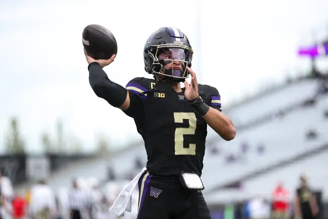Oct 10, 2025; Seattle, Washington, USA; Washington Huskies quarterback Demond Williams Jr. (2) warms up before the game against the Rutgers Scarlet Knights at Husky Stadium. Mandatory Credit: Kevin Ng-Imagn Images
