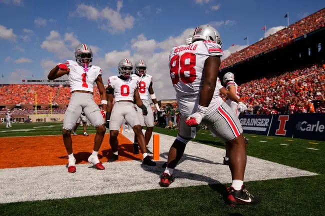 Ohio State Buckeyes defensive lineman Kayden McDonald (98) celebrates a fumble recovery after stripping the ball from Illinois Fighting Illini running back Ca'Lil Valentine (5) during the first half of the NCAA football game at Gies Memorial Stadium in Champaign on Oct. 11, 2025.