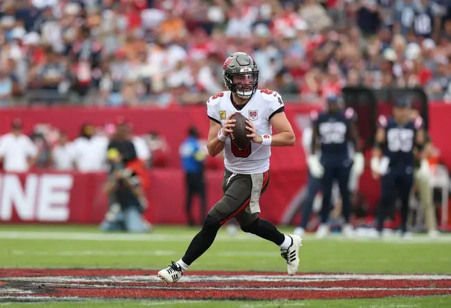 Nov 9, 2025; Tampa, Florida, USA; Tampa Bay Buccaneers quarterback Baker Mayfield (6) runs in the pocket during the first quarter against the New England Patriots at Raymond James Stadium. Mandatory Credit: Nathan Ray Seebeck-Imagn Images
