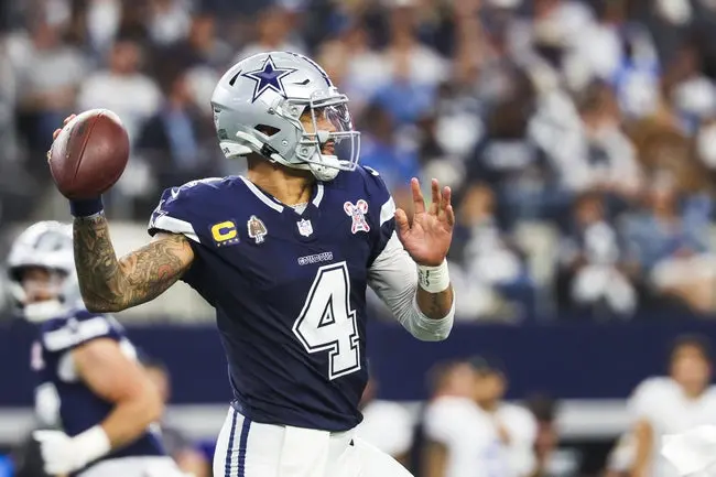featured-image-1766492812720 Dec 21, 2025; Arlington, Texas, USA; Dallas Cowboys quarterback Dak Prescott (4) passes against the Los Angeles Chargers during the first quarter at AT&T Stadium. Mandatory Credit: Kevin Jairaj-Imagn Images