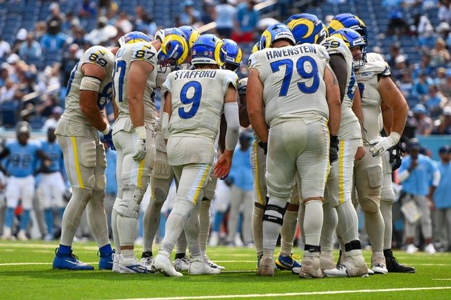 Sep 14, 2025; Nashville, Tennessee, USA; Los Angeles Rams quarterback Matthew Stafford (9) calls the play in the huddle against the Tennessee Titans during the second half at Nissan Stadium. Mandatory Credit: Steve Roberts-Imagn Images