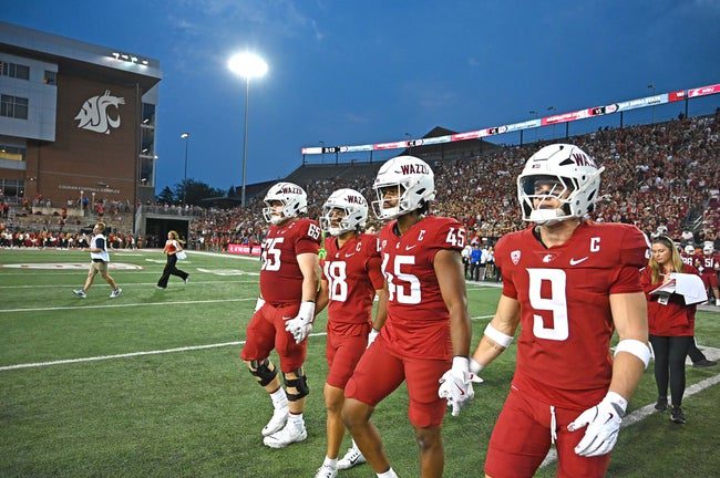 Sep 6, 2025; Pullman, Washington, USA; Washington State Cougars captains head to mid field before a game against the San Diego State Aztecs at Gesa Field at Martin Stadium. Mandatory Credit: James Snook-Imagn Images