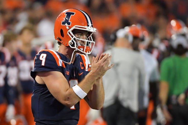 Sep 13, 2025; Champaign, Illinois, USA; Illinois Fighting Illini quarterback Luke Altmyer (9) applauds teammates during the second half against the Western Michigan Broncos at Memorial Stadium. Mandatory Credit: Ron Johnson-Imagn Images