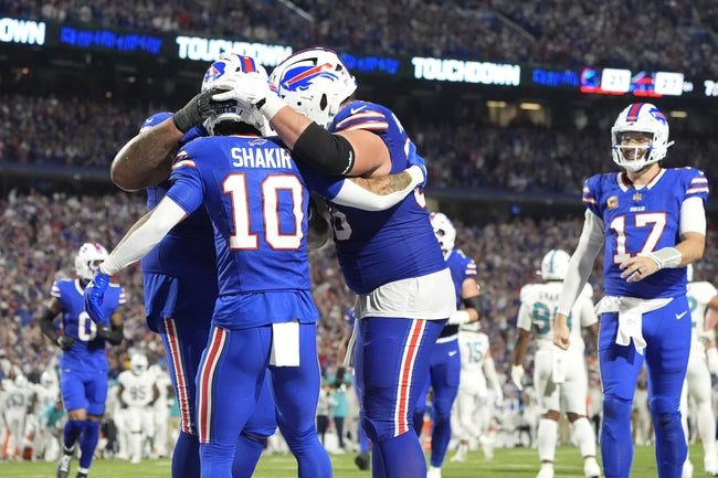 Sep 18, 2025; Orchard Park, New York, USA; Buffalo Bills wide receiver Khalil Shakir (10) celebrates with teammates after scoring a touchdown in the fourth quarter at Highmark Stadium. Mandatory Credit: Gregory Fisher-Imagn Images