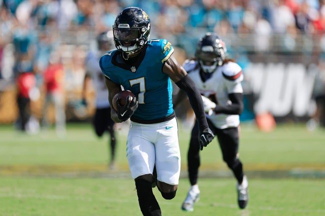 Jacksonville Jaguars wide receiver Brian Thomas Jr. (7) rushes for yards after a reception during the fourth quarter of an NFL football matchup at EverBank Stadium, Sunday, Sept. 21, 2025, in Jacksonville, Fla. The Jaguars defeated the Texans 17-10.