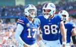 Sep 28, 2025; Orchard Park, New York, USA; Buffalo Bills quarterback Josh Allen (17) and tight end Dawson Knox (88) react after diving for a touchdown past New Orleans Saints cornerback Alontae Taylor (1) during the third quarter at Highmark Stadium. Mandatory Credit: Mark Konezny-Imagn Images