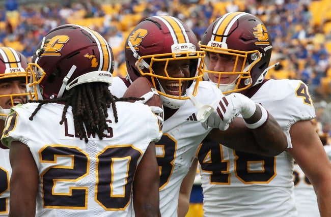 Sep 6, 2025; Pittsburgh, Pennsylvania, USA; Central Michigan Chippewas tight end DeCorion Temple (8) reacts with wide receiver Langston Lewis (20) and tight end Nathan VanTimmeren (48) after scoring a touchdown against the Pittsburgh Panthers during the third quarter at Acrisure Stadium. Mandatory Credit: Charles LeClaire-Imagn Images