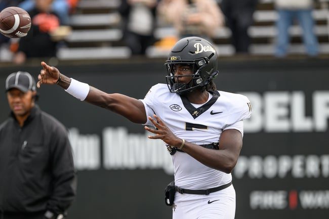 Oct 11, 2025; Corvallis, Oregon, USA; Wake Forest Demon Deacons quarterback Deshawn Purdie (5) throws a pass during warmups before the game against the Oregon State Beavers at Reser Stadium. Mandatory Credit: Craig Strobeck-Imagn Images
