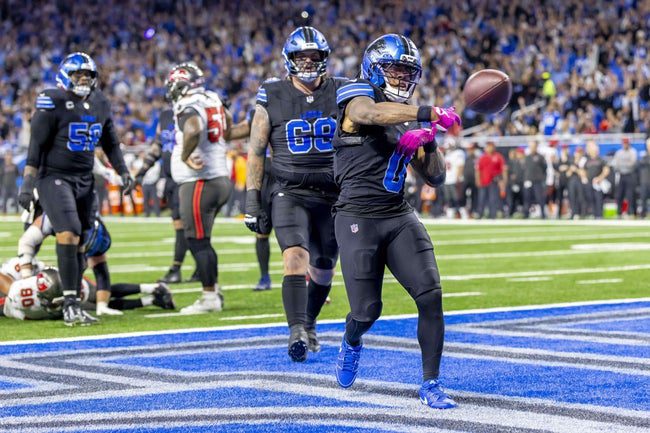 Oct 20, 2025; Detroit, Michigan, USA; Detroit Lions running back Jahmyr Gibbs (0) reacts after rushing for a touchdown against the Tampa Bay Buccaneers during the second half at Ford Field. Mandatory Credit: David Reginek-Imagn Images