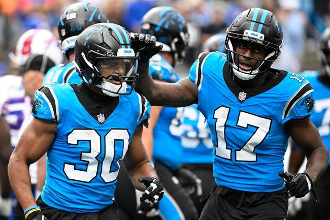 Oct 26, 2025; Charlotte, North Carolina, USA; Carolina Panthers running back Chuba Hubbard (30) celebrates with wide receiver Xavier Legette (17) after scoring a touchdown in the fourth quarter against the Buffalo Bills at Bank of America Stadium. Mandatory Credit: Bob Donnan-Imagn Images