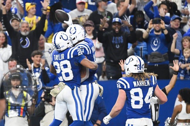 Oct 26, 2025; Indianapolis, Indiana, USA; Indianapolis Colts wide receiver Michael Pittman Jr. (11) celebrates with Indianapolis Colts running back Jonathan Taylor (28) after scoring a touchdown during the second quarter against the Tennessee Titans at Lucas Oil Stadium. Mandatory Credit: Robert Goddin-Imagn Images