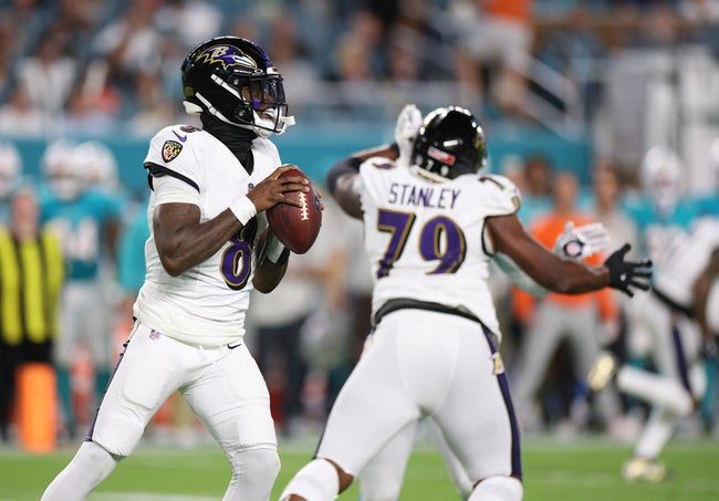 Oct 30, 2025; Miami Gardens, Florida, USA; Baltimore Ravens quarterback Lamar Jackson (8) looks to throw downfield during the first quarter against the Miami Dolphins at Hard Rock Stadium. Mandatory Credit: Nathan Ray Seebeck-Imagn Images