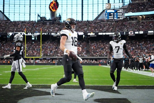 Nov 2, 2025; Paradise, Nevada, USA; Jacksonville Jaguars quarterback Trevor Lawrence (16) scores a touchdown during the second half against the Las Vegas Raiders at Allegiant Stadium. Mandatory Credit: Kirby Lee-Imagn Images