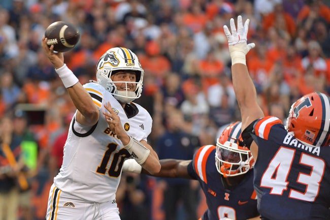 Sep 13, 2025; Champaign, Illinois, USA; Western Michigan Broncos quarterback Brady Jones (10) passes the ball against the Illinois Fighting Illini at Memorial Stadium. Mandatory Credit: Ron Johnson-Imagn Images