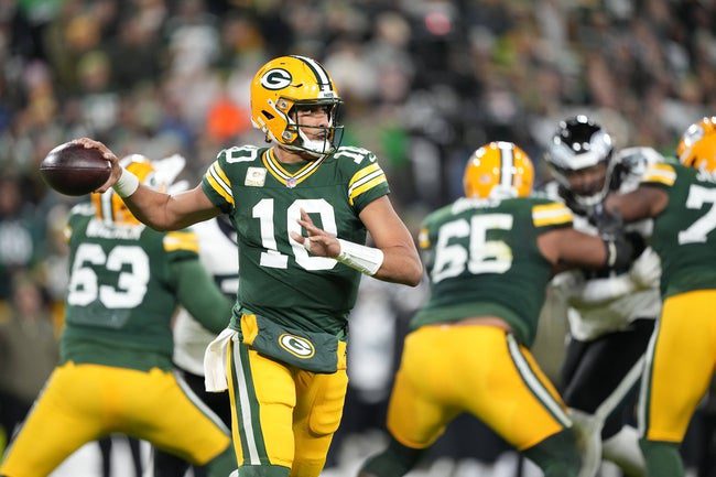 Nov 10, 2025; Green Bay, Wisconsin, USA; Green Bay Packers quarterback Jordan Love (10) looks downfield against the Philadelphia Eagles in the first half at Lambeau Field. Mandatory Credit: Jeff Hanisch-Imagn Images