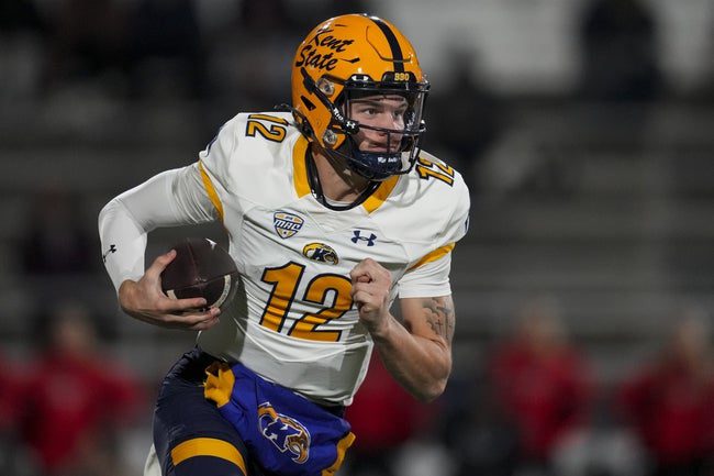 Nov 5, 2025; Muncie, Indiana, USA; Kent State Golden Flashes quarterback Dru Deshields (12) runs with the ball against the Ball State Cardinals in the first half at Scheumann Stadium. Mandatory Credit: Aaron Doster-Imagn Images