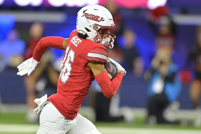 Dec 18, 2024; Inglewood, CA, USA; UNLV Rebels wide receiver Kayden McGee (16) completes a pass play as he runs for a touchdown in the first half against the California Golden Bears at SoFi Stadium. Mandatory Credit: Jayne Kamin-Oncea-Imagn Images
