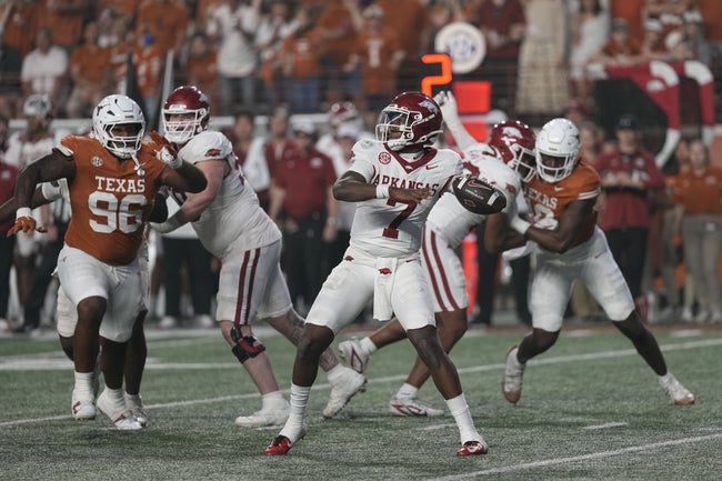 Nov 22, 2025; Austin, Texas, USA; Arkansas Razorbacks quarterback KJ Jackson (7) passes the ball during the second half against the Texas Longhorns at Darrell K Royal-Texas Memorial Stadium. Mandatory Credit: Scott Wachter-Imagn Images