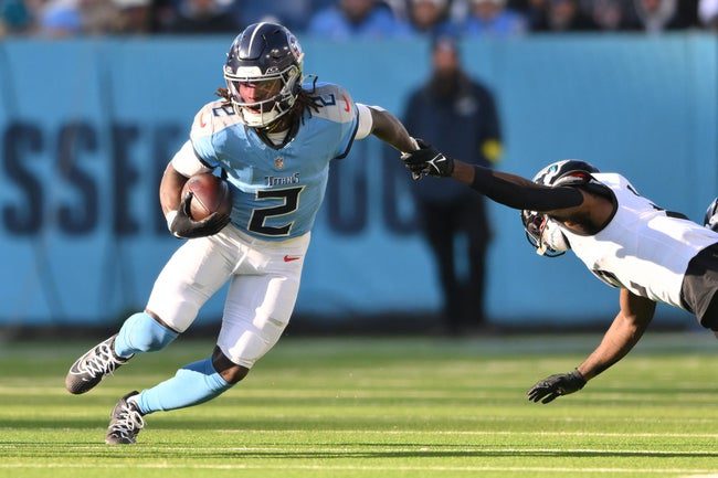Nov 30, 2025; Nashville, Tennessee, USA; Tennessee Titans running back Tyjae Spears (2) carries the ball against the Jacksonville Jaguars during the second half at Nissan Stadium. Mandatory Credit: Steve Roberts-Imagn Images