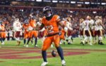 Nov 30, 2025; Landover, Maryland, USA; Denver Broncos running back RJ Harvey (12) celebrates after scoring a touchdown against the Washington Commanders in overtime of the game at Northwest Stadium. Mandatory Credit: Peter Casey-Imagn Images