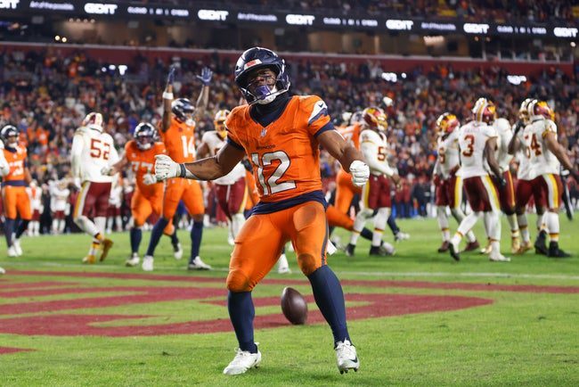 Nov 30, 2025; Landover, Maryland, USA; Denver Broncos running back RJ Harvey (12) celebrates after scoring a touchdown against the Washington Commanders in overtime of the game at Northwest Stadium. Mandatory Credit: Peter Casey-Imagn Images