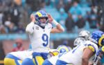 Nov 30, 2025; Charlotte, North Carolina, USA; Los Angeles Rams quarterback Matthew Stafford (9) calls a play during the fourth quarter against the Carolina Panthers at Bank of America Stadium. Mandatory Credit: Scott Kinser-Imagn Images