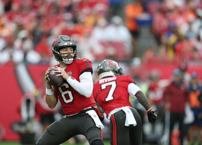 Dec 7, 2025; Tampa, Florida, USA; Tampa Bay Buccaneers quarterback Baker Mayfield (6) looks to throw downfield during the first quarter against the New Orleans Saints at Raymond James Stadium. Mandatory Credit: Nathan Ray Seebeck-Imagn Images