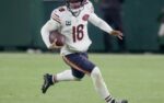 Chicago Bears quarterback Caleb Williams (18) runs for a first down during the third quarter of their game against the Green Bay Packers Sunday, December 7, 2025 at Lambeau Field in Green Bay, Wisconsin.