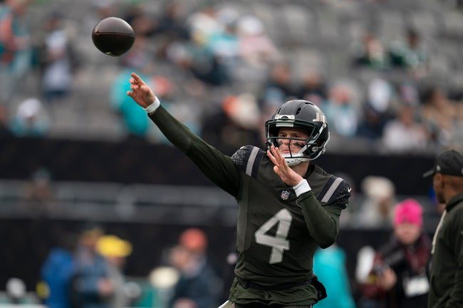 New York Jets quarterback Brady Cook (4) throws a ball during a warm up during a week 14 football game between the New York Jets and Miami Dolphins at MetLife Stadium on Sunday, Dec. 7, 2025.