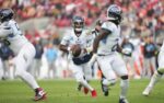 Dec 14, 2025; Santa Clara, California, USA; Tennessee Titans quarterback Cam Ward (1) runs with the ball during the second quarter against the San Francisco 49ers at Levi's Stadium. Mandatory Credit: Cary Edmondson-Imagn Images
