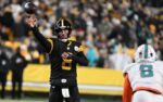 Dec 15, 2025; Pittsburgh, Pennsylvania, USA; Pittsburgh Steelers quarterback Aaron Rodgers (8) throws in the second quarter against the Miami Dolphins at Acrisure Stadium. Mandatory Credit: Barry Reeger-Imagn Images