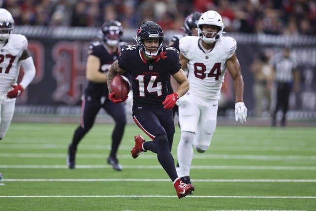 Dec 14, 2025; Houston, Texas, USA; Houston Texans wide receiver Jaylin Noel (14) returns a kickoff during the game against the Arizona Cardinals at NRG Stadium. Mandatory Credit: Troy Taormina-Imagn Images