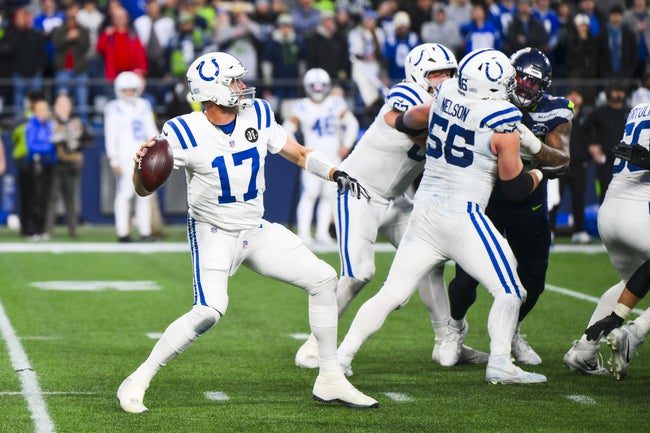 Dec 14, 2025; Seattle, Washington, USA; Indianapolis Colts quarterback Philip Rivers (17) passes against the Seattle Seahawks during the fourth quarter at Lumen Field. Mandatory Credit: Steven Bisig-Imagn Images