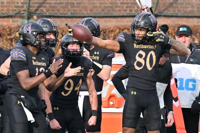 Nov 22, 2025; Chicago, Illinois, USA; Northwestern Wildcats wide receiver Hayden Eligon II (80) celebrates after a gain of yardage against the Minnesota Golden Gophers during the second half at Wrigley Field. Mandatory Credit: Patrick Gorski-Imagn Images