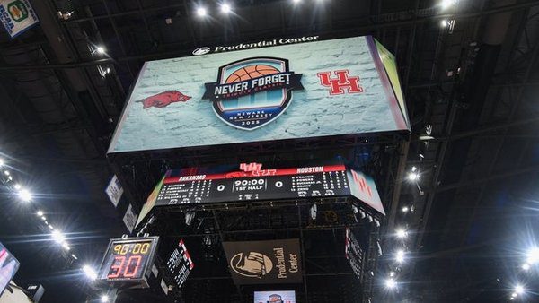I cannot extract a player name from this caption as it only describes a general arena view before the game between Arkansas Razorbacks and Houston Cougars, with no specific player mentioned.