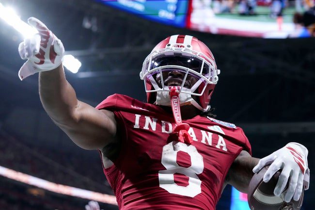 Indiana Hoosiers running back Kaelon Black (8) celebrates after rushing in a touchdown Friday, Jan. 9, 2026, during the Peach Bowl and semifinal game of the College Football Playoff against the Oregon Ducks at Mercedes-Benz Stadium in Atlanta.