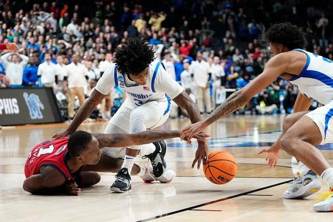 NCAAB player in action is key to our prediction & analysis tonight